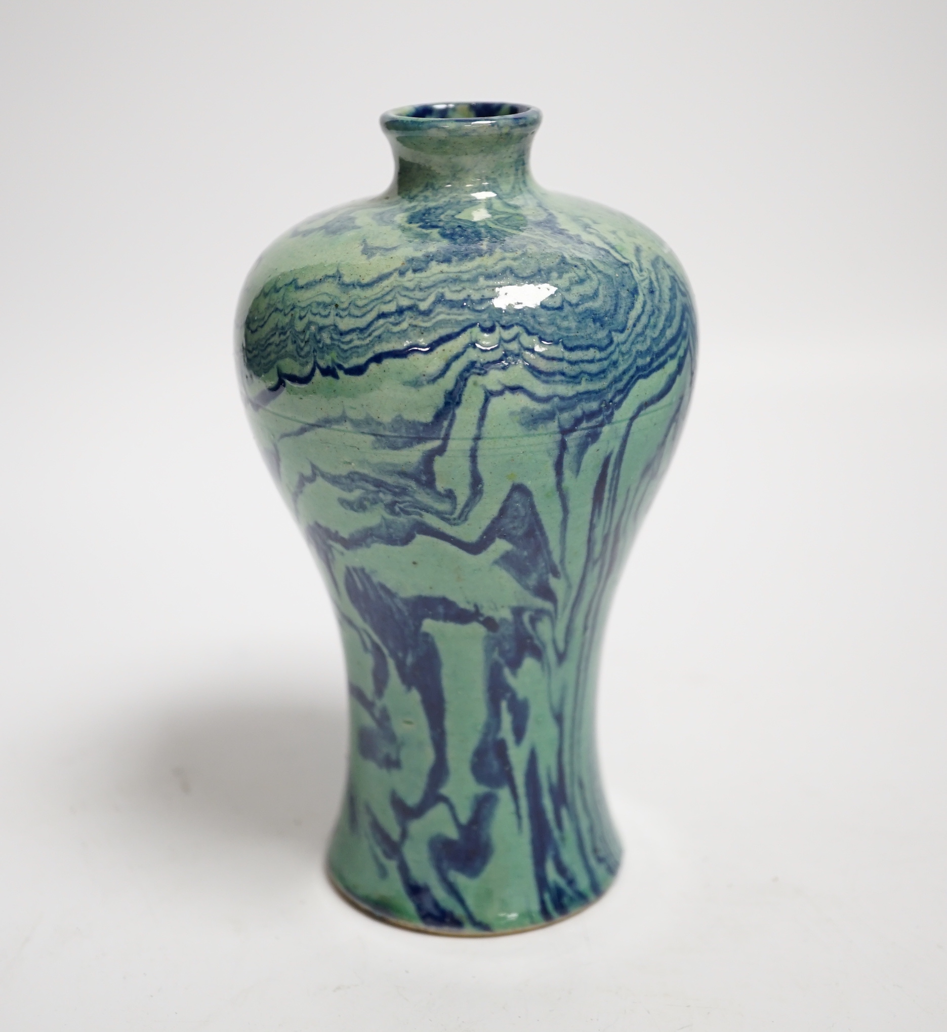 A Chinese marbled baluster vase, 15cm